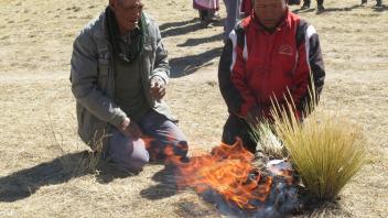 Before starting, an Aymara shaman and Alberto conducted a pago, or blessing ceremony