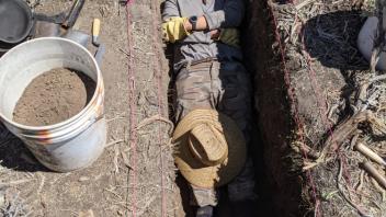 Buddy lies in his trench.