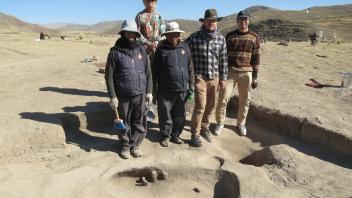 But eventually we learn the contents. Here, Victor, Billy, Alberto, Ian, and Caleb show a prehistoric roasting oven that they excavated.