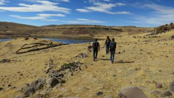 Fernando, Erika, and Lauren exploring the site of Sillusatni during a weekend break.