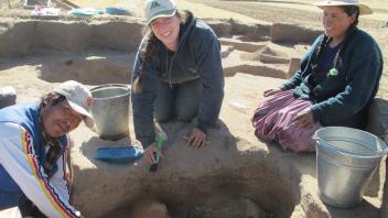 Mateo, Lauren, and Rocio excavating an Archaic Period feature at Soro Mik'aya Patjxa.