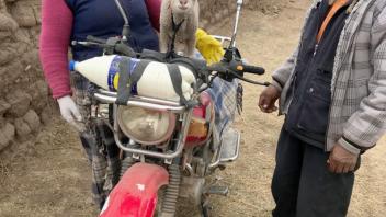 Panchita the lamb awaits our arrival with Norma and Juan at field camp.
