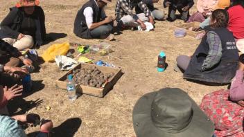 Watia lunch with the community.